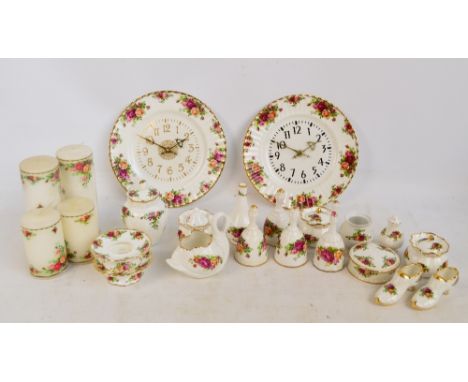 A group of various Royal Albert "Old Country Roses" pattern decorated items to include two plates, wall clocks, a pair of can