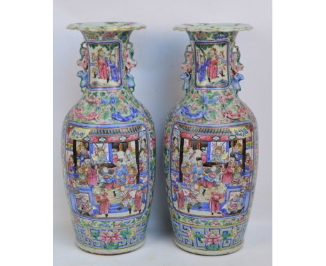 A pair of large 19th century Chinese Canton vases of baluster form, each painted in enamels with two opposing rectangular pan