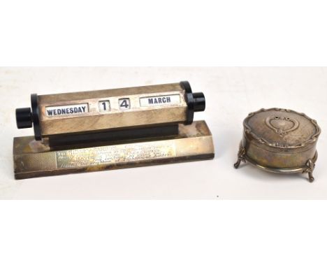 An Elizabeth II hallmarked silver loaded perpetual calendar with engine turned decoration, with octagonal cased turning wheel