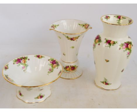 A large Royal Albert "Old Country Roses" pattern baluster vase, a further example with flared rim, and a fruit bowl (3).