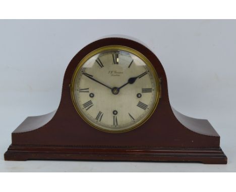 An Edwardian mahogany and chevron strung eight day mantel clock with circular silvered dial set with Roman numerals, inscribe