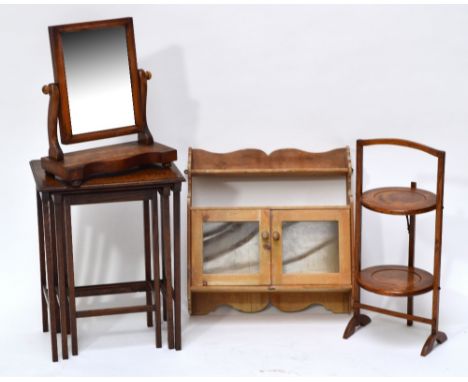 An oak nest of three rectangular tables, height 52cm, a two tier folding cake stand, height 60.1cm, a mahogany veneered swing