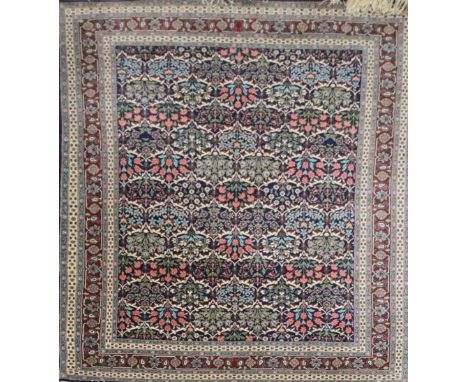 A modern Persian rug with floral panel decoration, 147 x 232cm.