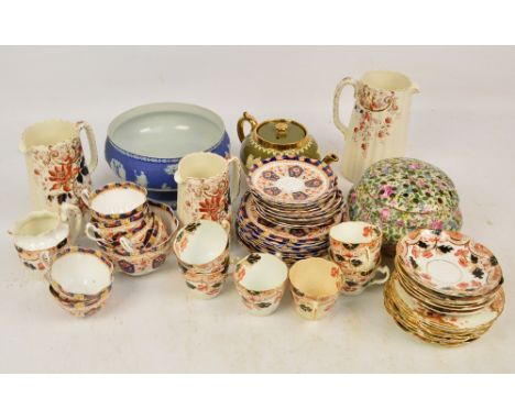 A small group of ceramics including a set of three Durham floral transfer decorated jugs, tallest height 20cm, a similarly de