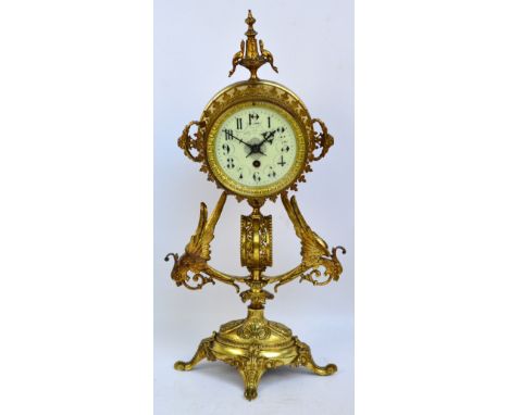 A decorative gilt metal clock, the circular enamel dial set with Arabic numerals inscribed "Albert Lercy & Cie Bruxelles", th