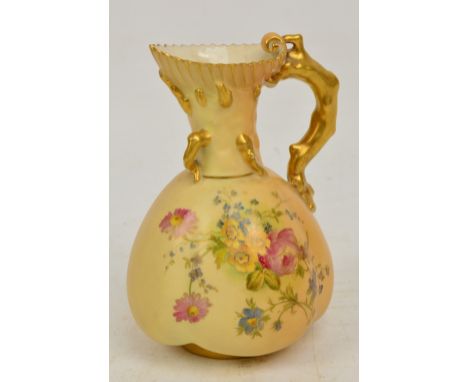 A Royal Worcester ivory blush jug of quatrilobed form decorated with floral sprays, with gilt handle modelled as a branch and