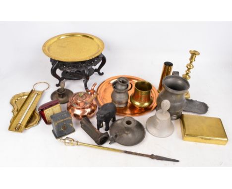 A quantity of metalware to include a brass Eastern decorated plate, a pair of candlesticks, a pair of candle snuffers, two th