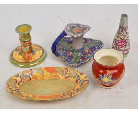CHARLOTTE RHEAD; a Crown Ducal chamber stick with tube line floral decoration, height 9cm, a Bursley Ware candlestick and ova