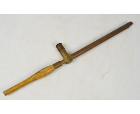 A WWI period military brass periscope with turned wooden handle, inscribed "MK IX, 1918, R&J. Buck, no.28553", length 58cm.