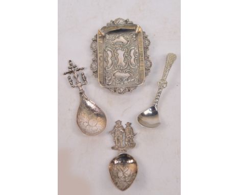 An Edward VII hallmarked silver shaped rectangular pin dish with embossed scroll decoration, W Coulthard & Co, Chester 1904, 