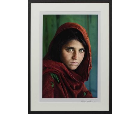 STEVE MCCURRY (AMERICAN b. 1950),SHARBAT GULA, AFGHAN GIRL, PAKISTAN offset lithographic colour print, signed in pen lower ri