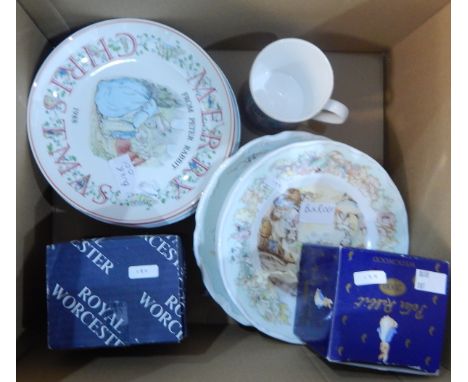 A set of four Royal Worcester collectors plates from the Peter Pan collection, a set of four Royal Doulton plates from The Wi