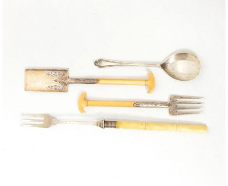 A Victorian novelty spade and fork with engraved silver plated tines and blade and ivory handles, a silver pickle fork with b