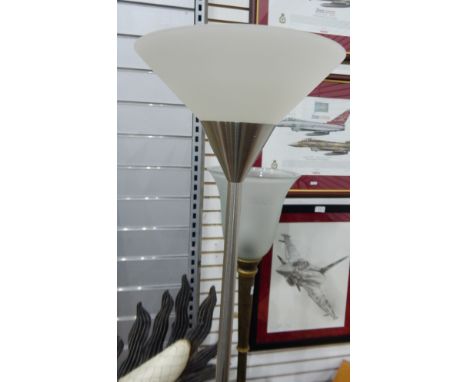An uplighter standard lamp with brass column and square platform base and a modern uplighter (2) 