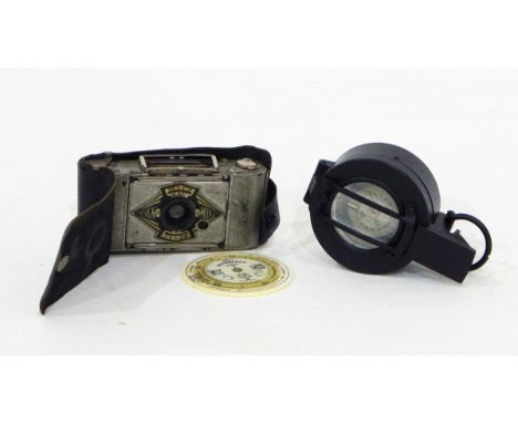 A Negretti & Zambra pocket forecaster patent number 6276/15 pocket compass together with a folding miniature camera (3) 