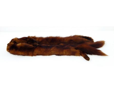 Two vintage fur tippets and a vintage fur muff with a zip, both within  two hat boxes 