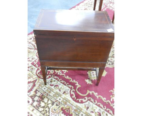 An Edwardian inlaid mahogany workbox on tapering square legs, straight stretcher and an Edwardian inlaid mahogany occasional/