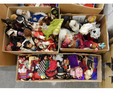 A large quantity of costume dolls including Henry VIII and his wives, dolls in national costume and various props (5 boxes) 