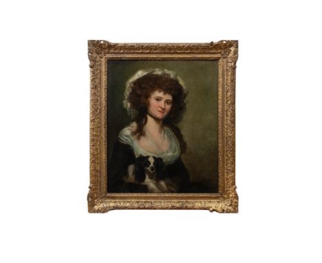 Attributed to Mather Brown (1761 - 1831) Portrait of a young lady with King Charles Cavalier  Oil on canvas In a carved and g