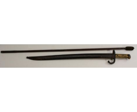 A 19th century French Chassepot bayonet, 57.5cm serpentine blade, the spine dated 1867, curved quillon, brass ribbed grip, st
