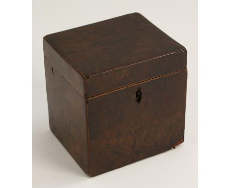 A George III burr yew cube tea caddy, hinged cover, outlined throughout with boxwood stringing, 12cm high, 11.5cm wide, c.179