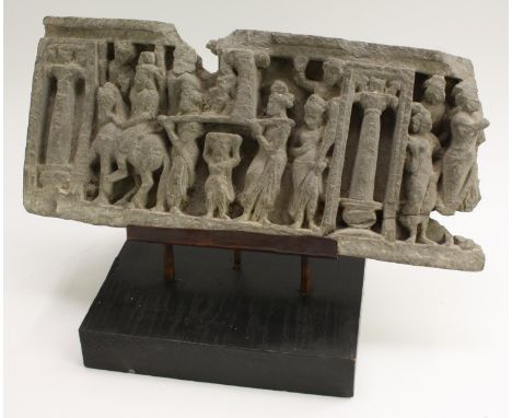 Antiquities - a Gandhara stone frieze stele, carved with figures in relief with figures in an architectural setting, 19cm x 4