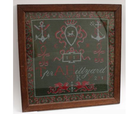 World War I - an early 20th century woolwork 'sampler', probably the work of a convalescent soldier, worked in threads of red