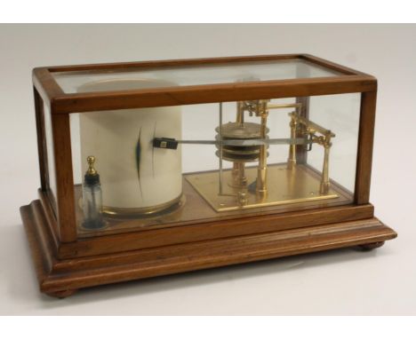 A late 19th century walnut four bellow barograph, by Woodward and Son, Derby, glased case enclosing gilt brass mechanism with