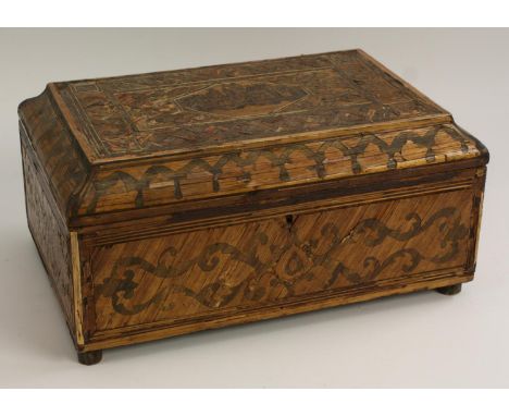 A large French Napoleonic prisoner of war dressing box, hinged caddy top inlaid with a lozenge shaped townscape vignette, the
