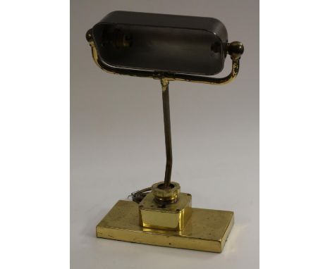 An early 20th century brass adjustable desk lamp, by Gabriel &amp; Co, Birmingham, rectangular bakelite shade, rectangular ba