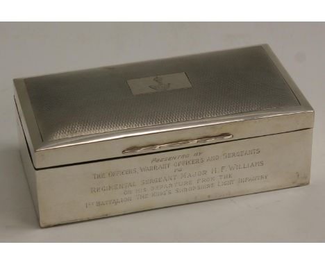 Military Interest - an early Elizabeth II silver rectangular cigarette box, inscribed Presented by the Officers, Warrant Offi