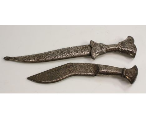 An Indian niello/bidri khanjar dagger, 17.5cm blade, lotus hilt, conforming scabbard, 30cm long overall; another, kukri shape