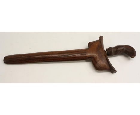 An Malay Indonesian kris, 23cm wavy blade, hardood stylised lotus handle, hardwood scabbard, 39cm long