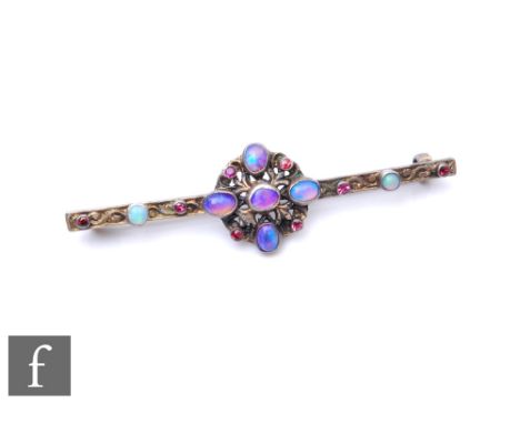 An Arts &amp; Crafts silver bar brooch set with opal in a stylised Celtic design, length 5cm, unmarked. 