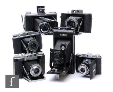 A collection of assorted British made rangefinder folding cameras, to include Ensign Selfix 820, Ensign Selfix 16-20, Agilux 