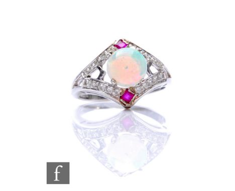 A 14ct white gold opal, ruby and diamond cluster, central cabochon set opal with a ruby set above and below all to a diamond 