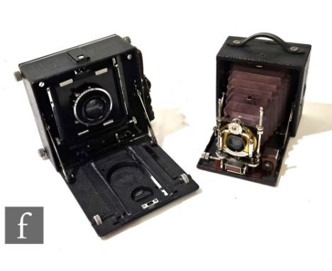 An Eastman Kodak Plate Camera Series 10 in leather case with brown bellows and Bausch &amp; Lomb lens, alongside a MPP Englan