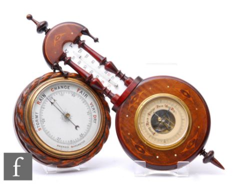 A small Edwardian inlaid mahogany aneroid barometer by Lufte of Berin, height 58cm, and a circular aneroid barometer in rope 
