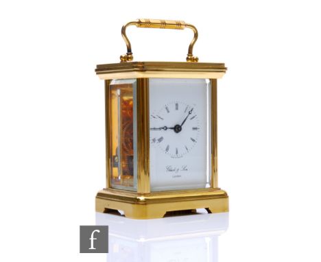 A 20th Century miniature brass carriage clock by Gluck &amp; Son London, on bracket feet, height 8cm. 