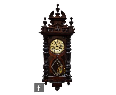 A late 19th Century walnut cased Vienna regulator wall clock, the eight day spring driven movement by Gustav Becker, enclosed