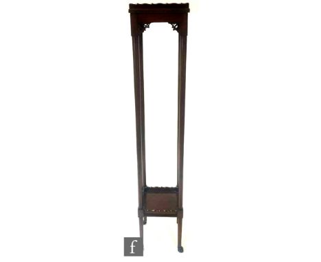 A tall early 20th Century Chippendale style mahogany jardinière, the square gallery top over four slender legs and pieced cor