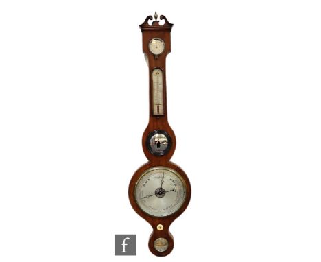 A 19th Century mahogany wheel barometer by J M Cassera Stourbridge, incorporating thermometer and dry/damp dial, height 98cm.