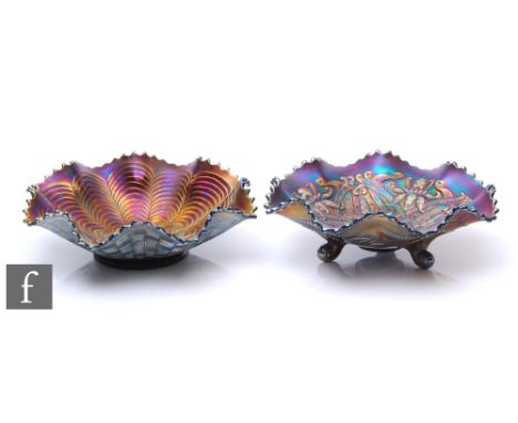 Two early 20th Century Carnival glass bowls by Northwood, the first a three footed bowl with ruffle rim, relief moulded to th