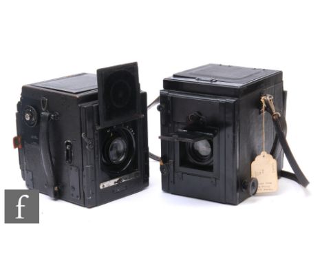 An early 20th Century Thornton Pickard Ruby Reflex plate camera, with black body and leather neck strap, together with anothe