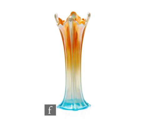 An early 20th Century Carnival glass vase of sleeve form with moulded pillars and wave rim, by Northwood, relief moulded in t