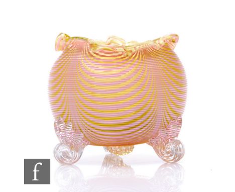 A late 19th Century Stevens and Williams glass posy bowl, decorated with an opal pulled loop on citron cased in pink threadin