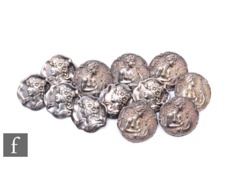 Two sets of six Art Nouveau hallmarked silver circular buttons, each with a portrait of a young woman, Birmingham 1901&nbsp;S