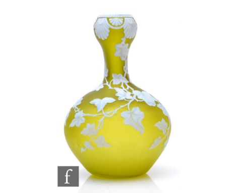 A late 19th Century Thomas Webb &amp; Sons cameo glass vase of compressed globe and shaft form with swollen rim, cased in opa