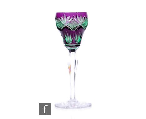 An early 20th Century Stevens &amp; Williams liqueur drinking glass, the ogee bowl double colour cased in dark ruby over gree