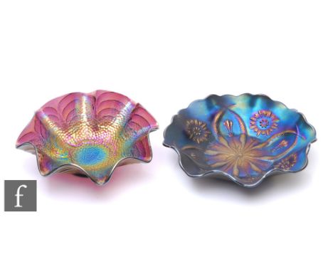 Two pieces of early 20th Century carnival glass, a shallow bowl with wave edged rim, by Brockwitz, relief moulded to the well